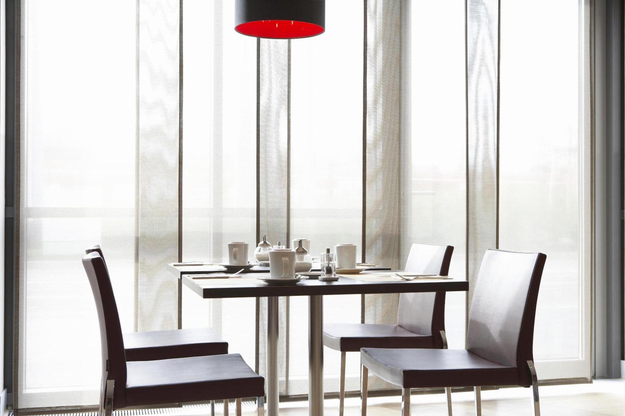 Intercityhotel MHG Restaurante foto